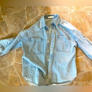 Women’s light wash denim shacket.